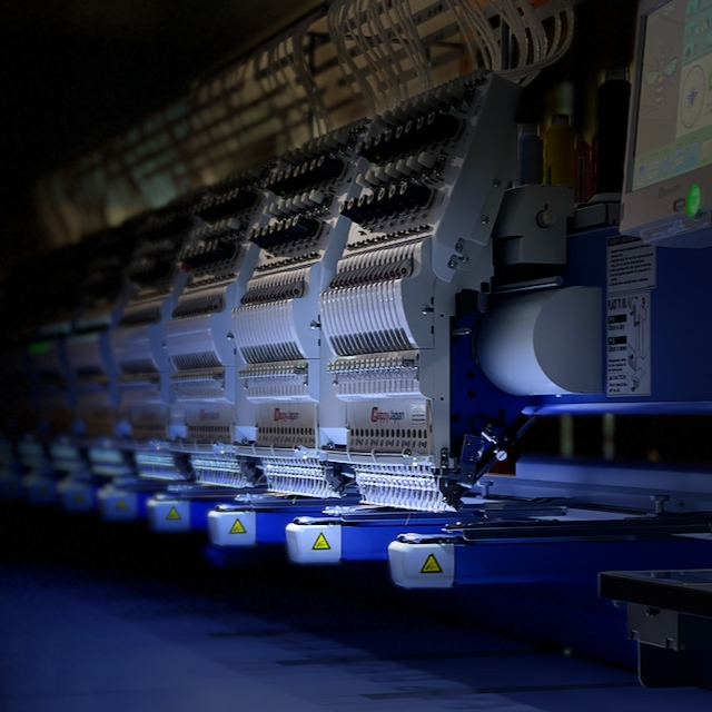 Multi-head embroidery machines